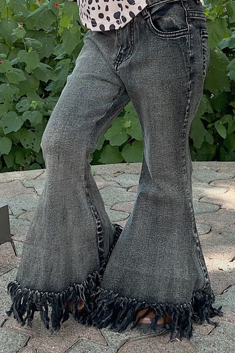 Black fringe bottom jeans hotsell